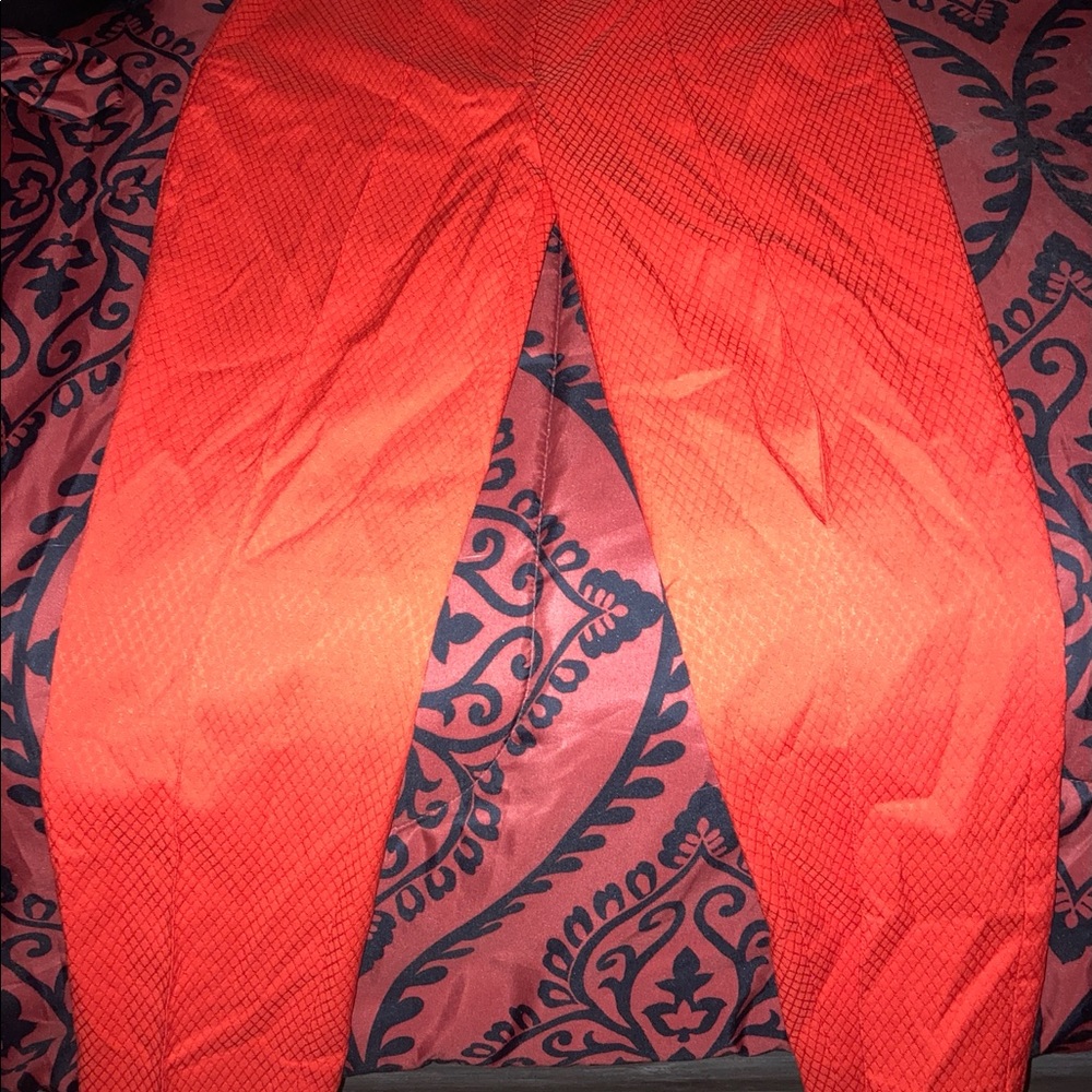 Brand new pair of Junior’s size 9 orange pants